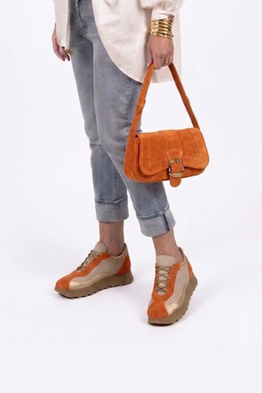 Dress sneakers in apricot orange and gold leather with thick rubber soles and round toe - Worn view
